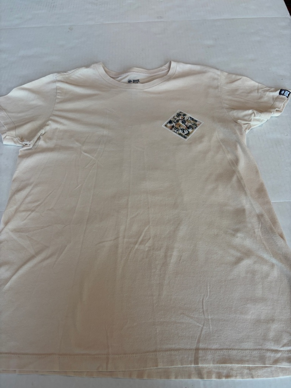 Salty Crew Short Sleeve Tee in light tan with Small Chest Patch design on back